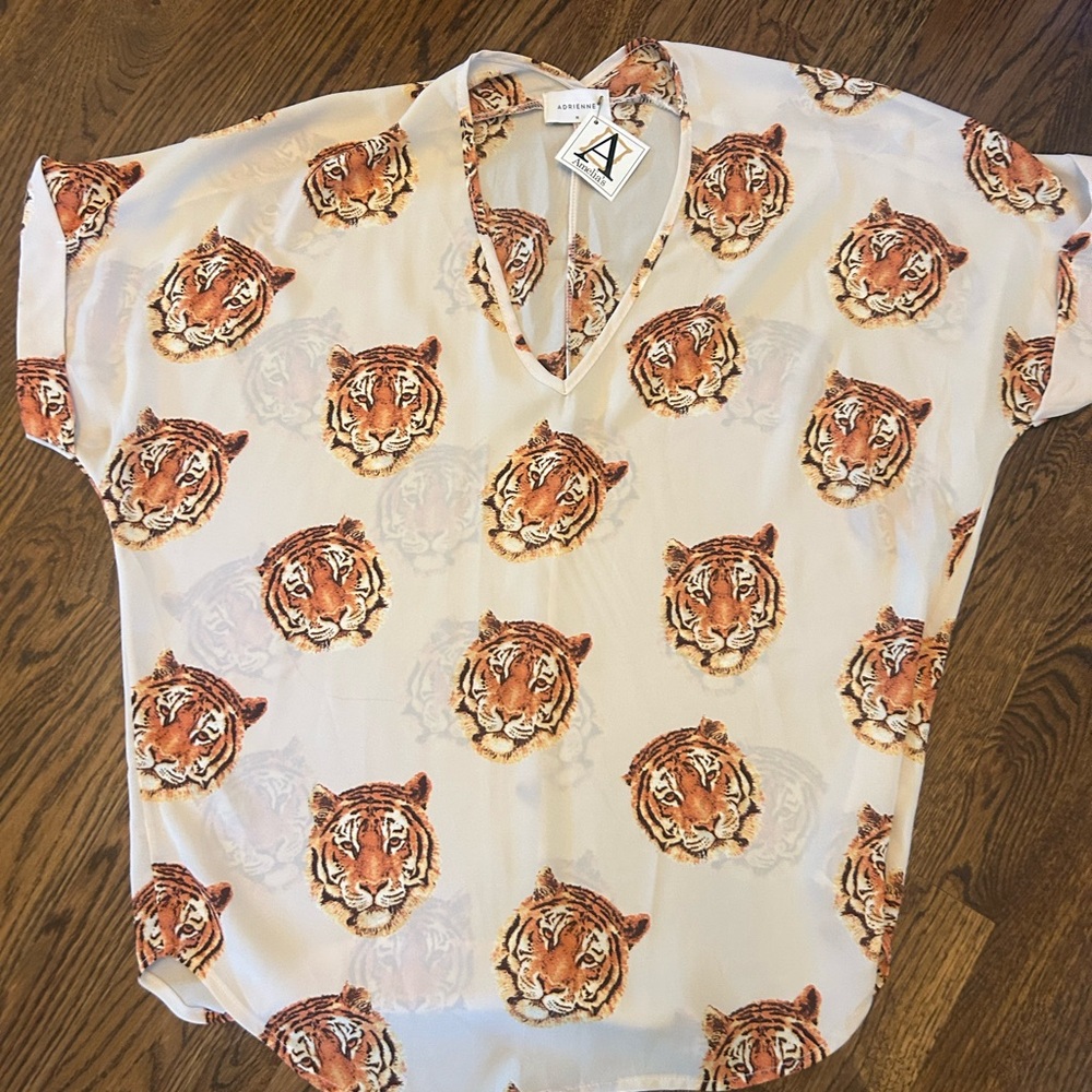 Adrienne Cream Tiger Print Top. Never worn. Perfect for game days!